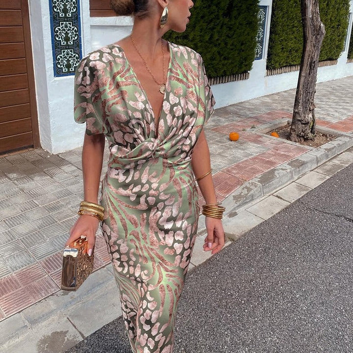 Kelsey - Long dress with v-neck and twisted detail